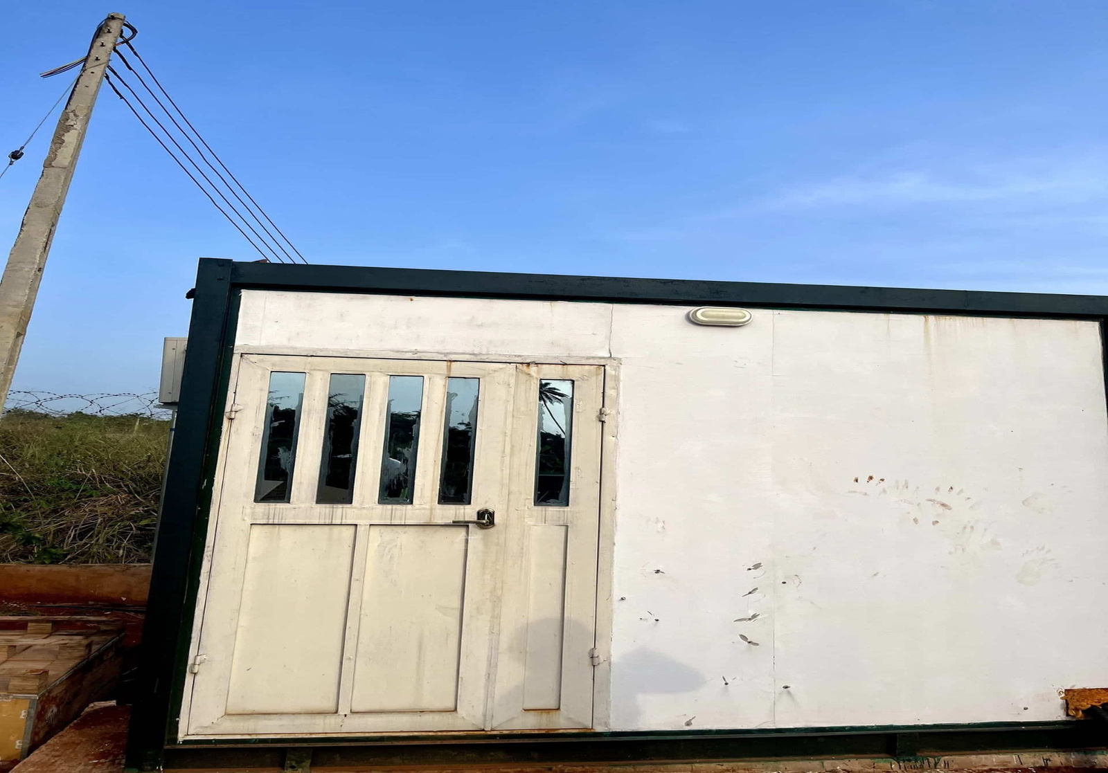 Equipment shelter for an agricultural solar power system