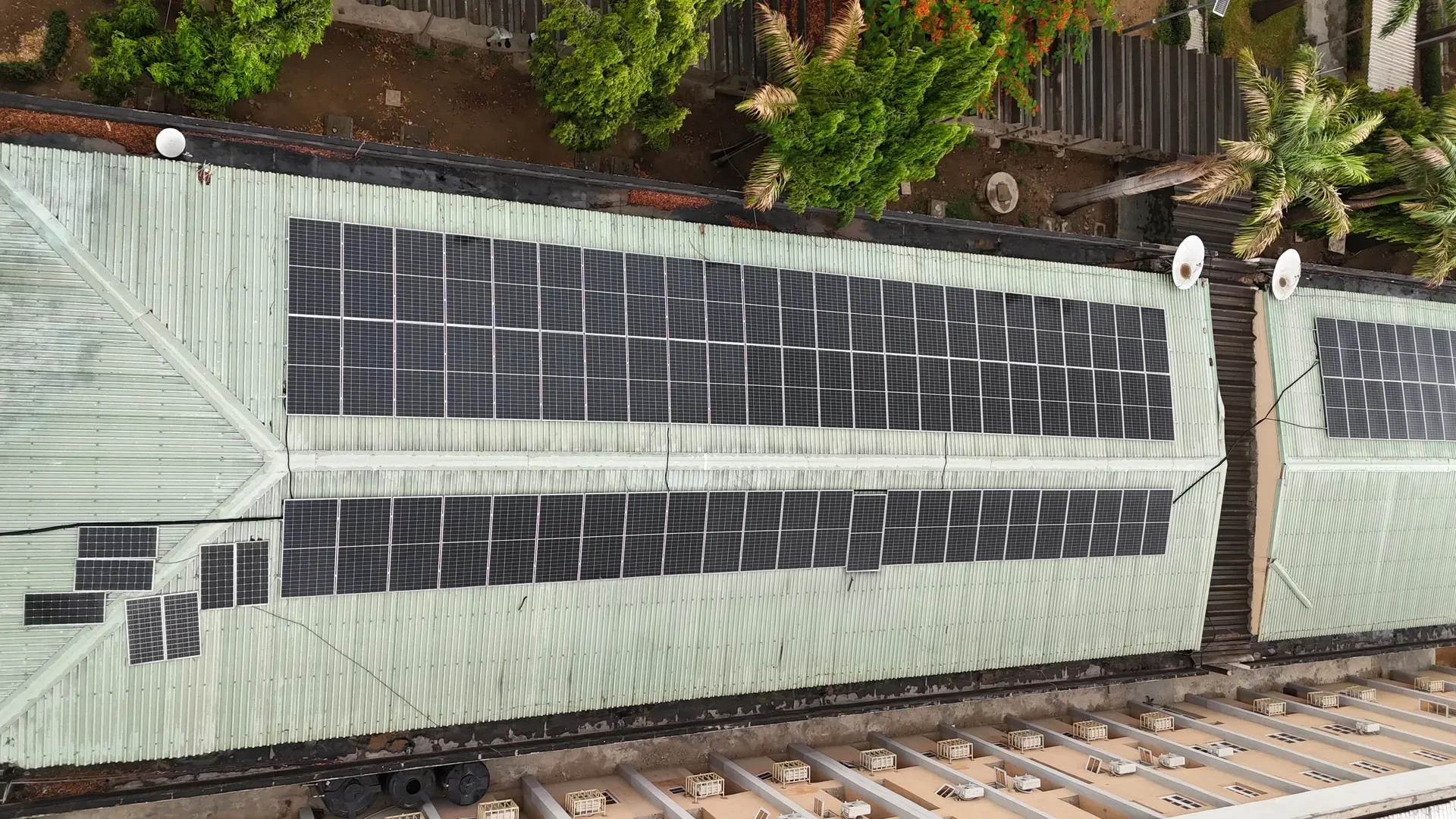 Rooftop solar panels installed on hotel and apartment buildings